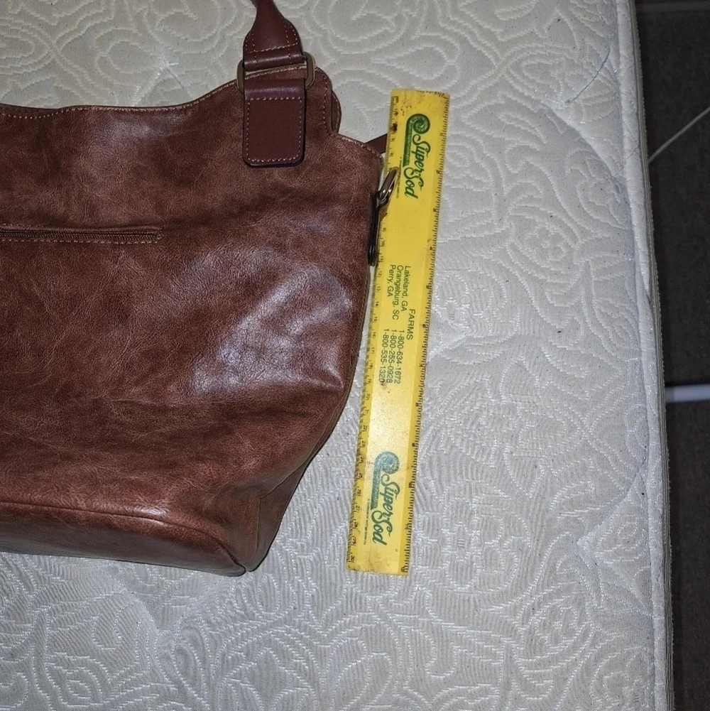 Unbranded soft leather (pleather) purse. It's in EUC, like new. 13